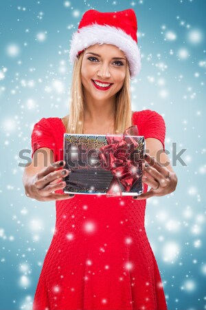 portrait of a santa woman with a christmas gift stock photo 08