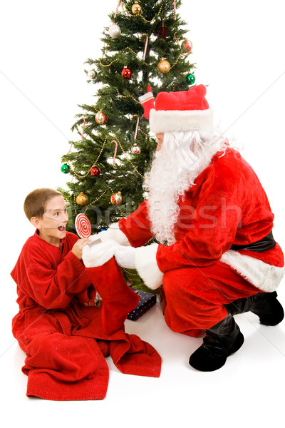 圣诞节 very excited little boy getting his christmas stocking