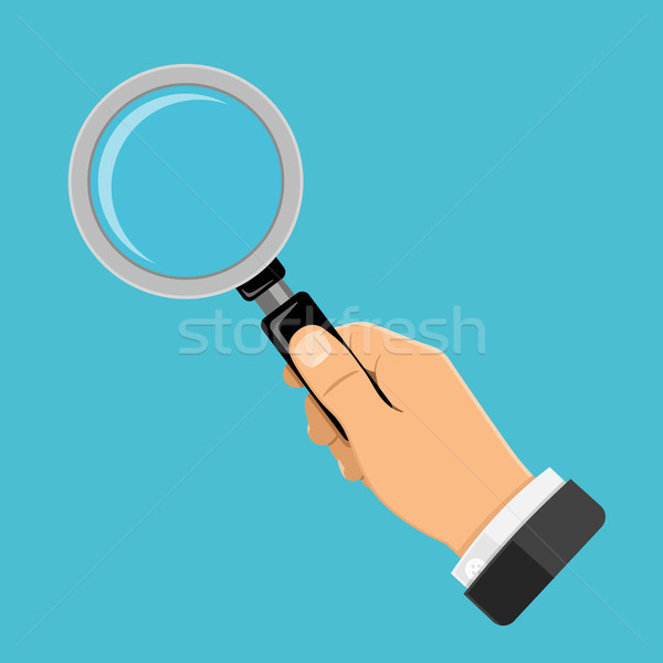 Stock photo: Magnifying Glass in Hand