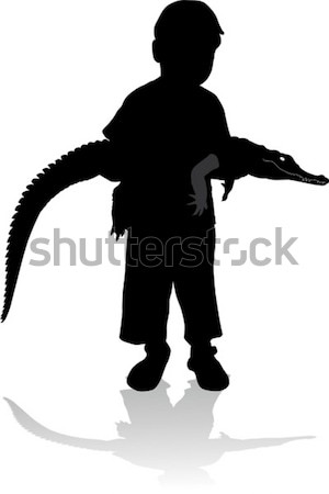 Stock photo: Child with crocodile