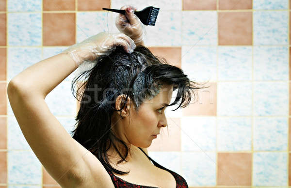 woman dyeing hairs Stock photo © 26kot