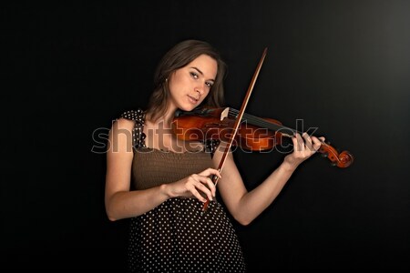 Violonist izolat negru mână faţă femei Imagine de stoc © 26kot