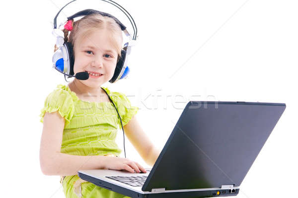 Menina computador retrato encantador criança fone de ouvido Foto stock © 26kot