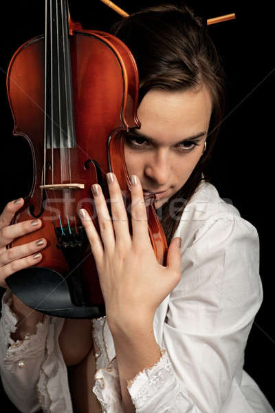 Violonist izolat negru mână faţă femei Imagine de stoc © 26kot