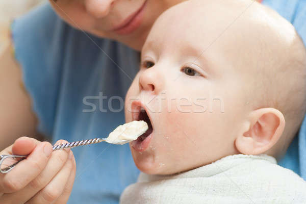 Alimentos para bebês feliz criança mão cara fundo Foto stock © 26kot