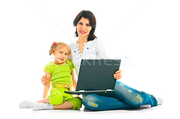 Stock photo: ma and daughter with computer
