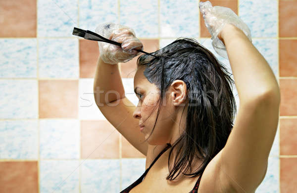 woman dyeing hairs Stock photo © 26kot