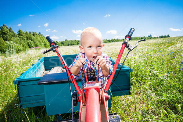 child controls the cultivator and truck Stock photo © 26kot