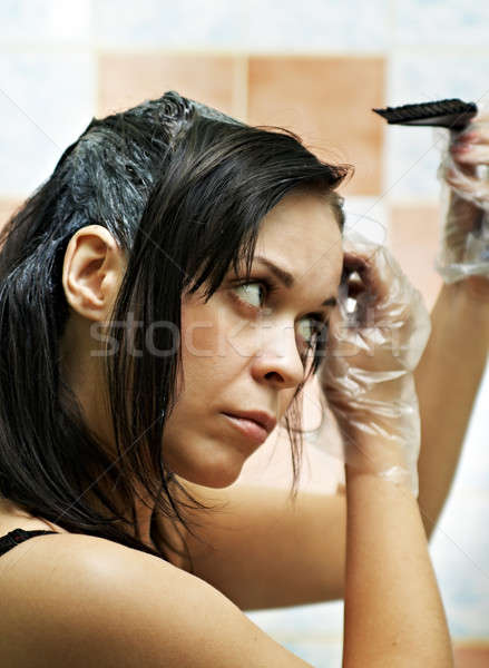 Stock photo: woman dyeing hairs