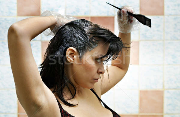 woman dyeing hairs Stock photo © 26kot