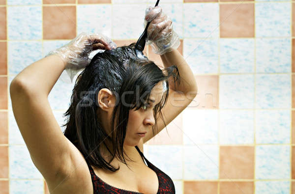 woman dyeing hairs Stock photo © 26kot