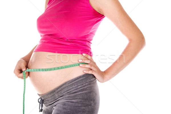 Femme enceinte main enfant corps Homme studio Photo stock © 26kot