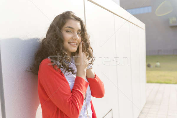 Woman calling on phone walking in the street Stock photo © 2Design