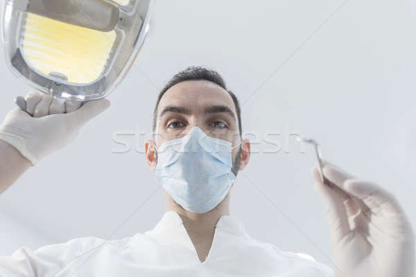 Foto stock: Dentista · mascarilla · quirúrgica · espejo