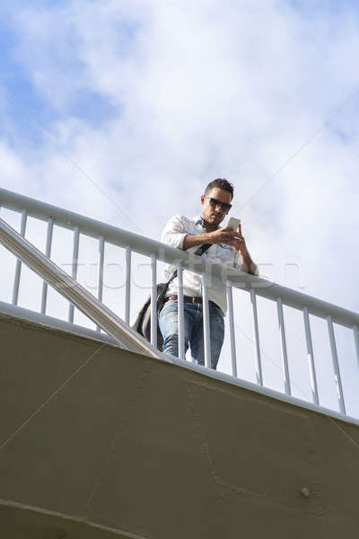 Portrait of an office worker using a mobile phone Stock photo © 2Design