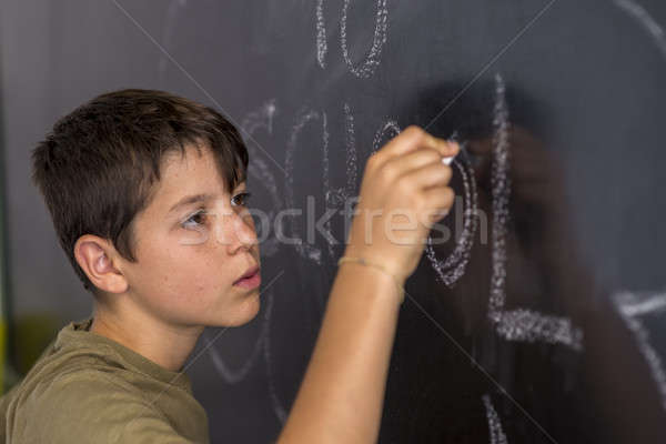Young teen and blackboard with ' back to school ' written Stock photo © 2Design