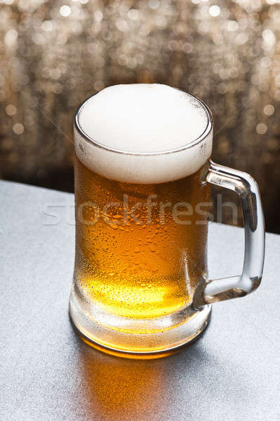 Beer mug in front of a glittering background Stock photo © 3523studio