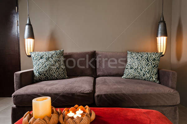 Brown two seated sofa dark ambience Stock photo © 3523studio