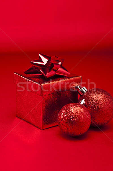Red bauble and Christmas present Stock photo © 3523studio
