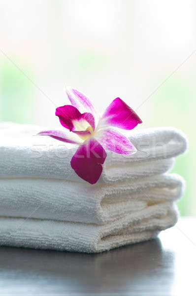 Stock photo: Spa towels and orchid flowers