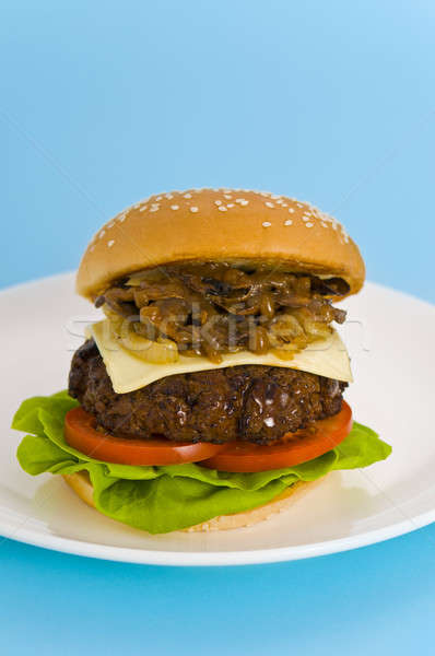 Hamburger with cheese tomato and salad Stock photo © 3523studio
