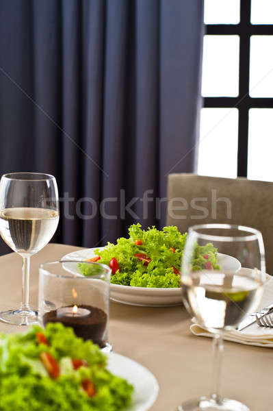 Inside interior table setting with beautiful salad Stock photo © 3523studio