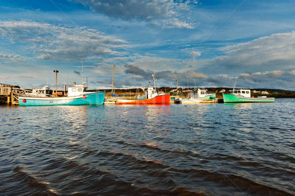 Fishing boat during sunset Stock photo © 3523studio