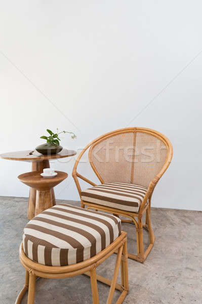 Beautiful bamboo rattan furniture in front of a white wall Stock photo © 3523studio
