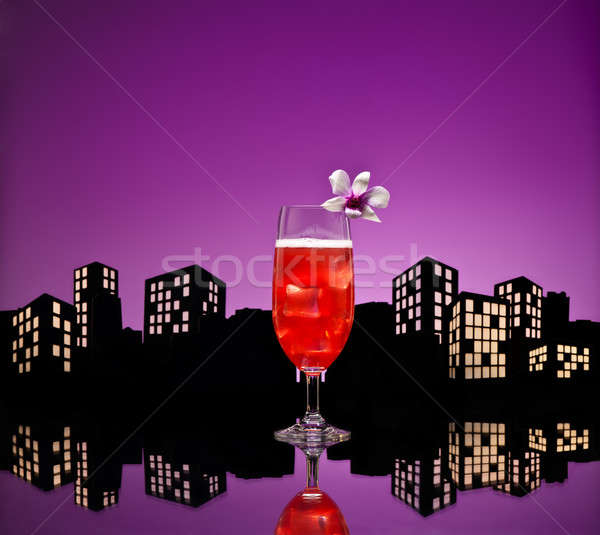 Stock photo: Metropolis Singapore Sling cocktail in city skyline setting