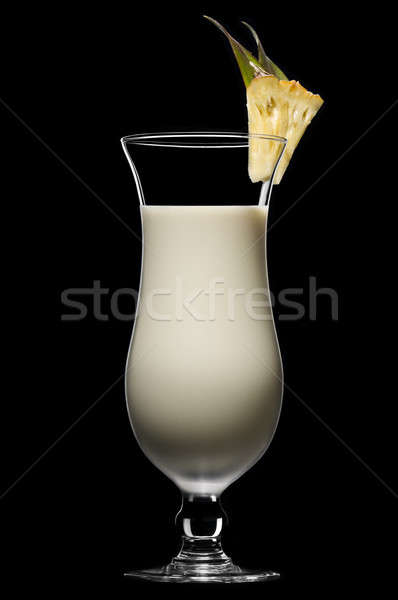 Pina colada in a beautiful long drink glass Stock photo © 3523studio