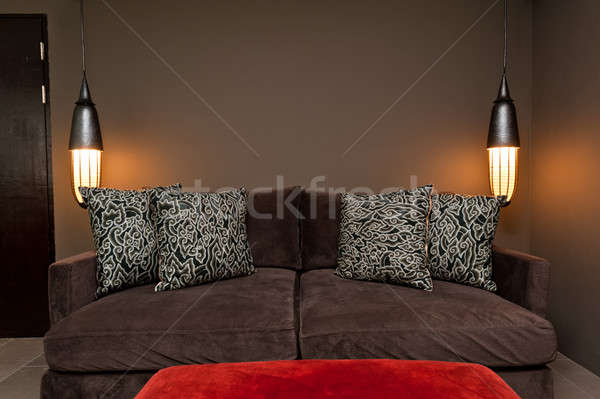 Brown two seated sofa dark ambience Stock photo © 3523studio