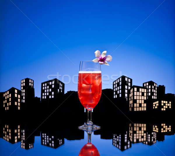 Metropolis Singapore Sling cocktail in city skyline setting Stock photo © 3523studio