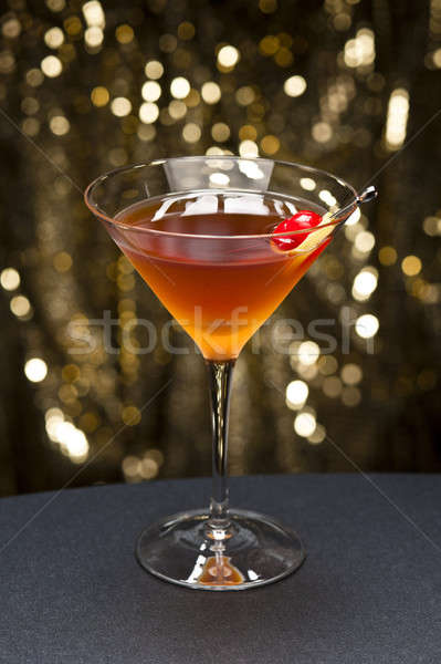 Manhattan cocktail garnished with a cherry and lemon Stock photo © 3523studio