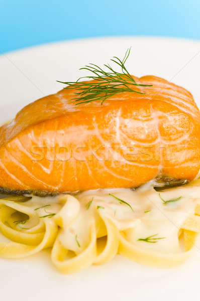 Salmon steak on pasta, decorated with dill closeup Stock photo © 3523studio