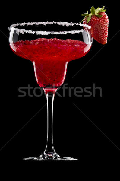 Stock photo: Strawberry Margarita in front of a black background