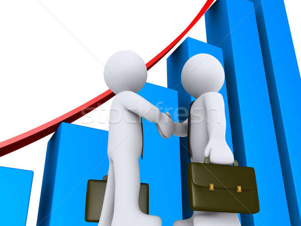 Stock photo: Businessmen handshake with graph as background