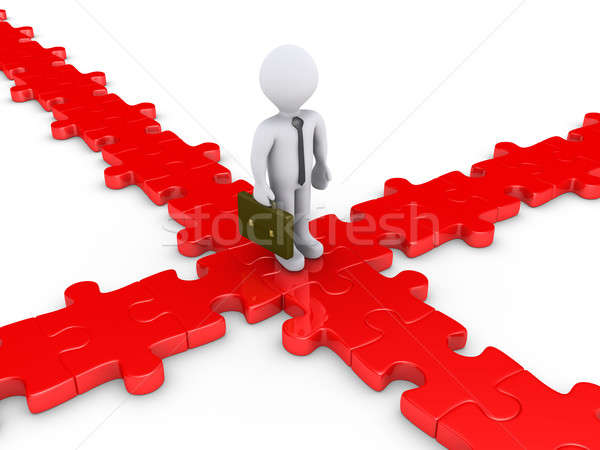 Businessman on puzzle pieces wondering for the right path Stock photo © 6kor3dos