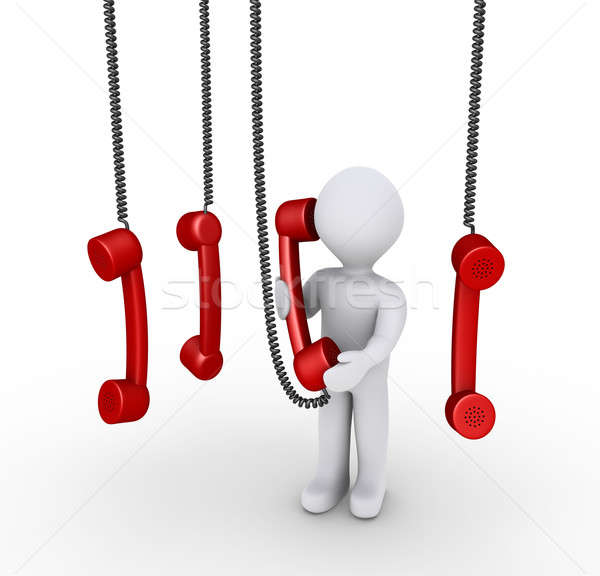 Person talking on phone receiver and others hanging from above Stock photo © 6kor3dos