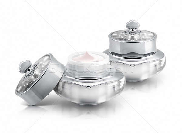 Two silver deluxe cosmetic jar on white background Stock photo © 7Crafts