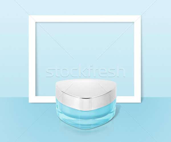 Blue triangle cosmetic jar on paper frame background Stock photo © 7Crafts