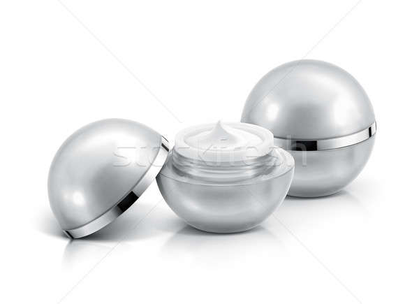 Doua argint sferă cosmetic borcan alb Imagine de stoc © 7Crafts