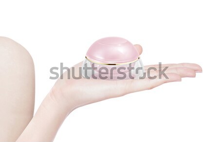 White rounded cosmetic jar on hand isolated Stock photo © 7Crafts