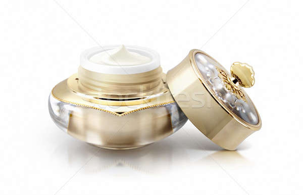 Single golden crown cosmetic jar on white background Stock photo © 7Crafts