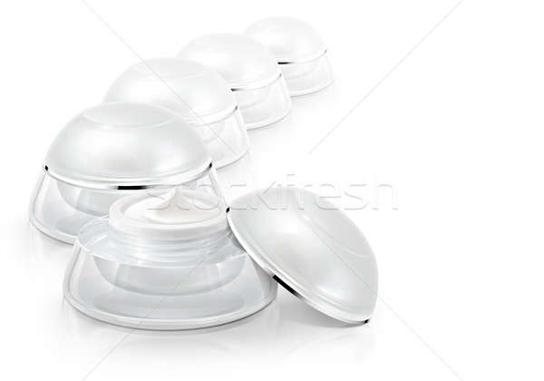 Several white rounded cosmetic jar on white background Stock photo © 7Crafts