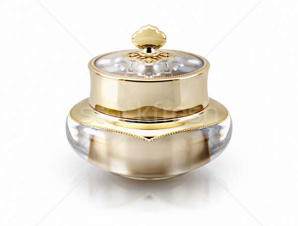 Single golden crown cosmetic jar on white background Stock photo © 7Crafts