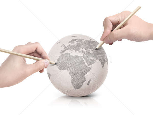 Two hand shade drawing Europe map on paper ball Stock photo © 7Crafts