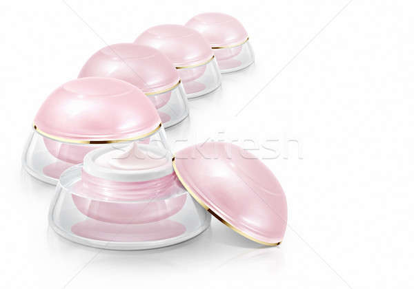 Several pink dome cosmetic jar on white background Stock photo © 7Crafts