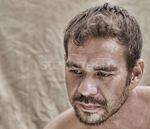 serious man looking down thinking Stock photo © 808isgreat