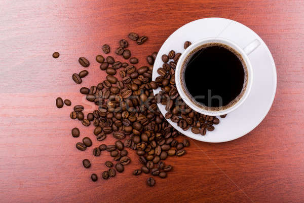 Cup of coffee and spilled grain Stock photo © a2bb5s
