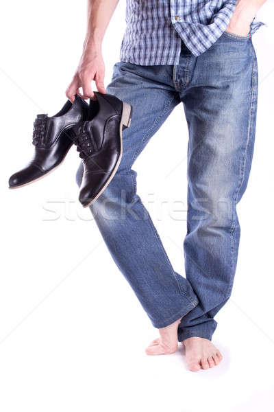 Men's holding a pair shoes Stock photo © a2bb5s